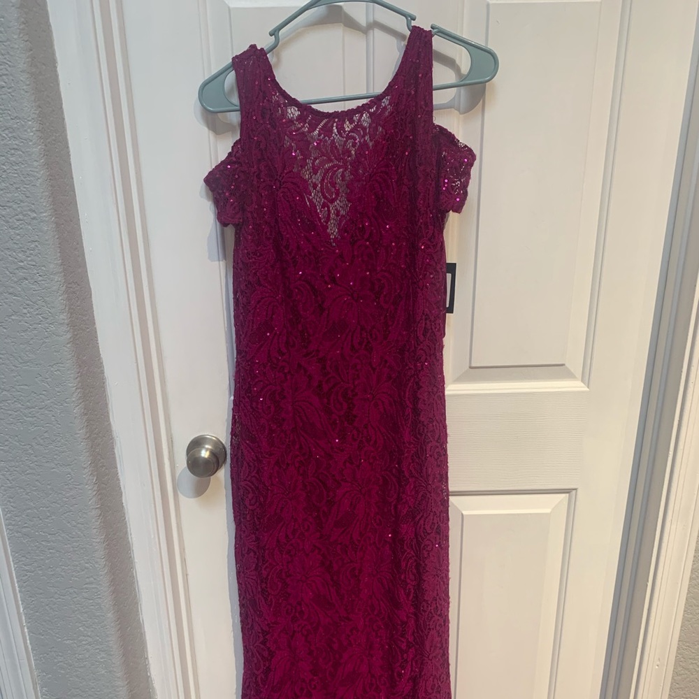 Brand New with Tags size 8.